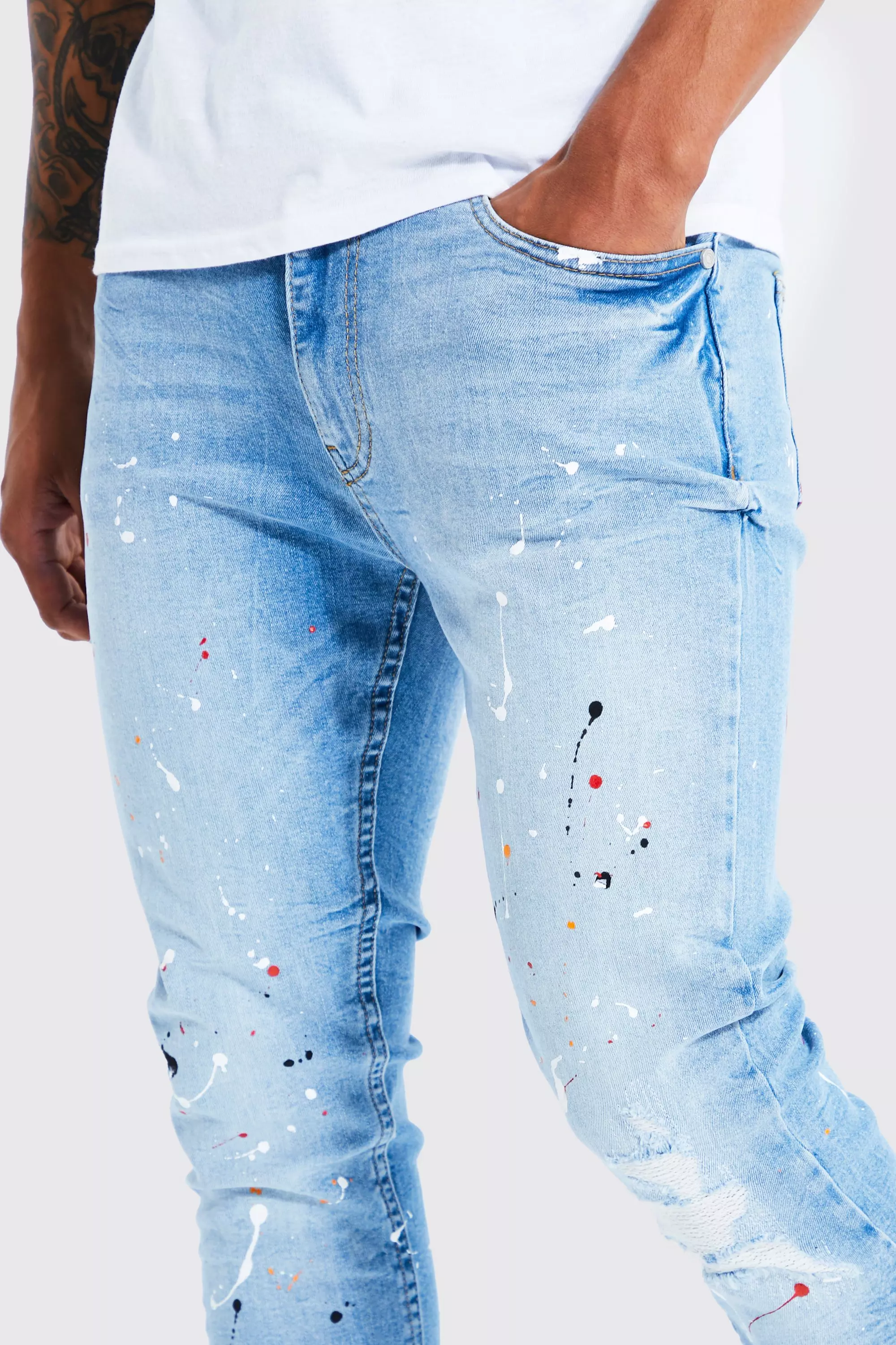 Skinny Paint Splatter Busted Knee Jeans | boohooMAN UK